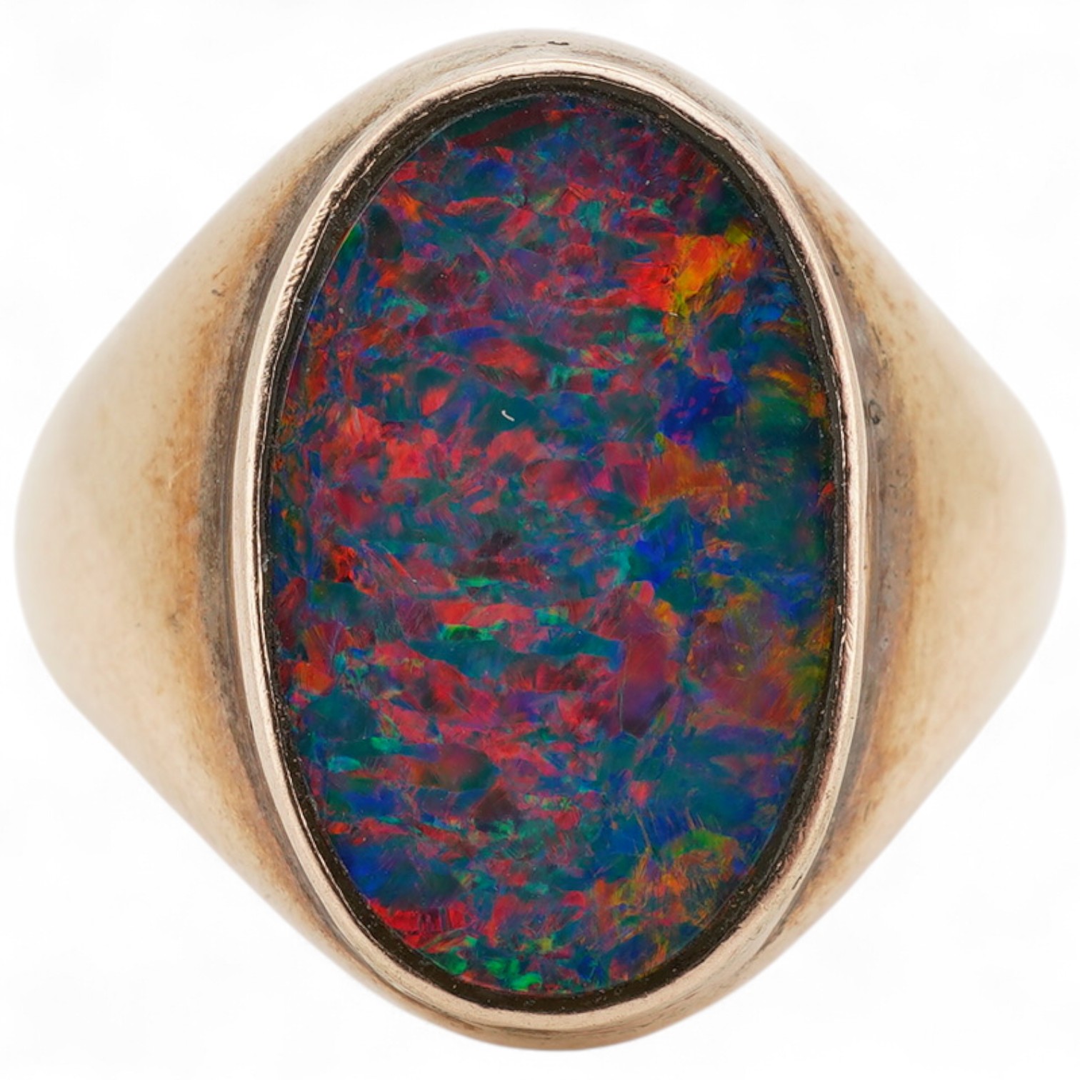 An opal doublet signet ring, set with a polished black opal measuring approximately 14.7 x 9 x 2.8mm, within a gold mount, size O, stamped 14K, gross weight approximately 6 grams